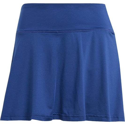 The ADIDAS Women's Club Tennis Skirt in navy features a wide waistband and breathable mesh for comfort and mobility. Made from recycled materials, its A-line silhouette is perfect for the court.