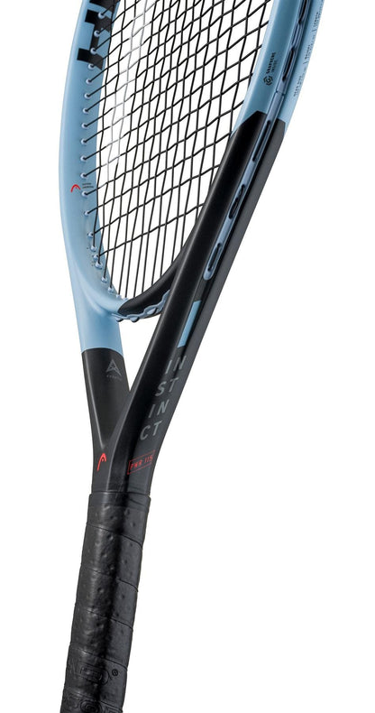 A close-up of the HEAD Instinct PWR 2025 Tennis Racket, a lightweight model by HEAD with a light blue and black frame, black strings and grip—ideal for intermediate club players—and displaying "INSTINCT" on the side.
