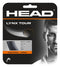 The HEAD Lynx Tour Tennis String Set - Black by HEAD features a stylish packaging in black and orange, prominently displaying its specifications of 1.25 mm gauge over 12 m (40 ft) of premium monofilament designed for superior control and spin. An eye-catching image, focusing on half of a person's face, underscores the product's precision and style.