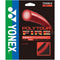 The image displays a package of Yonex Polytour Fire Tennis String (12m) in red, showcasing SIF Technology to boost power and spin. The packaging is black with a red design, prominently featuring the Yonex logo on the left side. It emphasizes durability and identifies the string type as hard polyester monofilament.