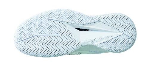 The image displays the sole of a white shoe featuring a herringbone tread pattern, engineered for superior traction on various surfaces. Expertly designed as Yonex Power Cushion Eclipsion 5 Womens Tennis Shoes, they incorporate Yonex's Power Cushion technology to boost comfort and support during demanding games.