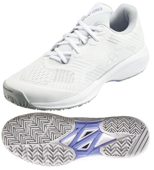 Experience style and function with Yonex Power Cushion Sonicage 2025 Women's Tennis Shoes in White/Grey. Featuring a mesh upper, gray accents, and herringbone-patterned sole, these lightweight sneakers are enhanced with Power Cushion technology for ultimate comfort and durability.