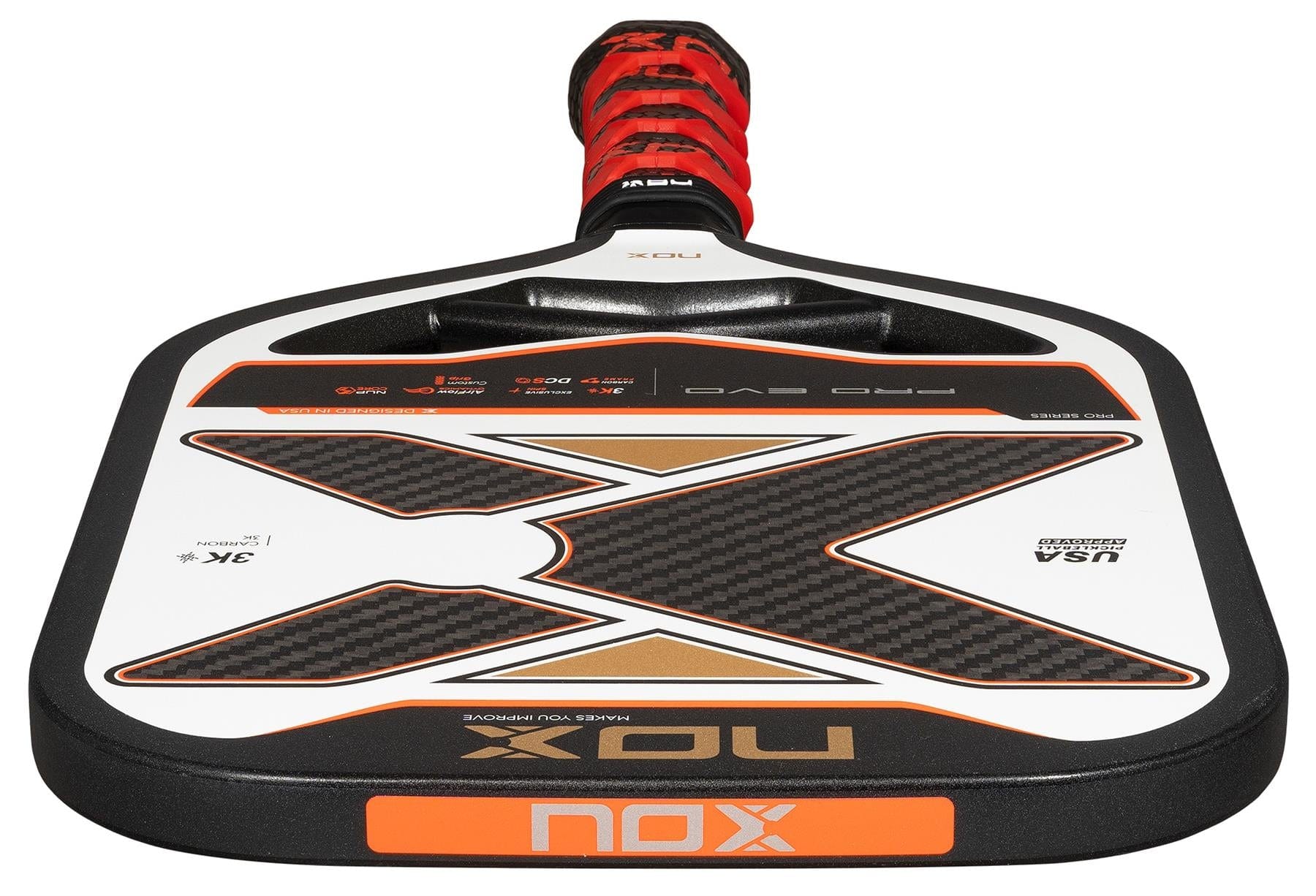 A close-up of the NOX Pro Evo Pickleball Paddle by NOX, showing its black, white, and orange design with carbon fiber details. Enhanced spin and control, plus "Pro Evo" and "USA Pickleball Approved" are visible on the paddle.
