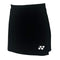 The Yonex YSKT2024 Women's Tennis Skirt/Skort in black, made from lightweight breathable materials, features the brand's iconic small white logo with circular and triangular shapes on the lower left side.
