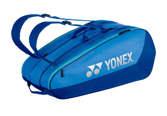 Yonex 42529EX Team 9 Racket Tennis Bag in Blast Blue with two compartments and adjustable shoulder straps. Features the Yonex logo in white on the side.