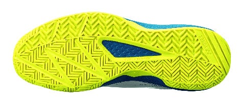 The image features the sole of the Yonex Power Cushion Lumio 4 Men's Tennis Shoes, showcasing a vibrant yellow, textured zigzag pattern with accents of ocean blue. This Durable Skin Light design enhances grip and traction while maintaining a lightweight feel for optimal performance on the tennis court.