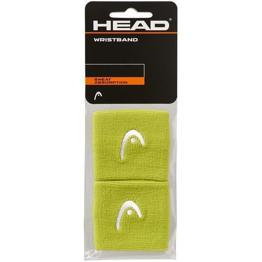 The packaging showcases a pair of lime HEAD 2.5" Tennis Wristbands, prominently displaying the white HEAD logo. These wristbands are designed for superior sweat absorption, making them ideal for enhancing on-court performance.