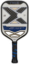 The NOX Pro Shot Pickleball Paddle features a large black and gray X design with blue accents, carbon fibre construction for durability and enhanced spin, and a black and blue grip tape handle. Brand name “NOX” displayed at the top.
