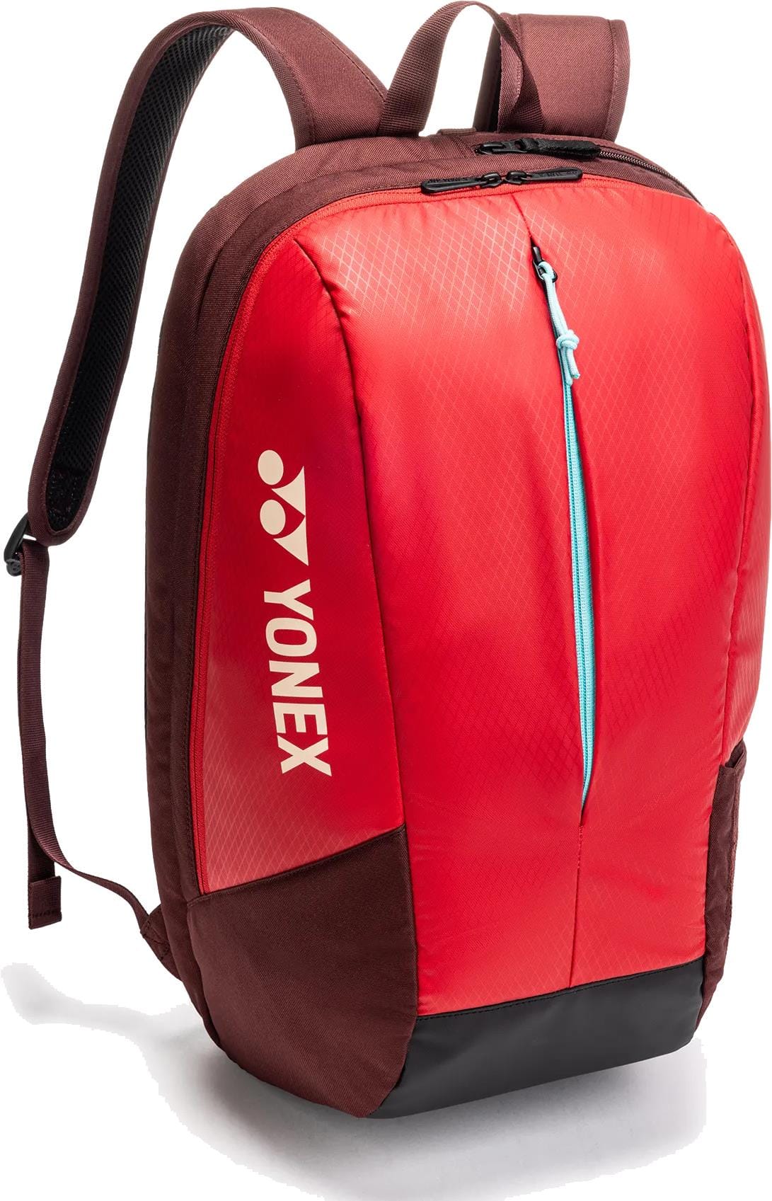 The Yonex 42512EX Team Tennis Backpack in ruby red features a front zipper pocket, blue zipper detail, adjustable padded straps, and a bold white Yonex logo—ideal for racket sports fans.