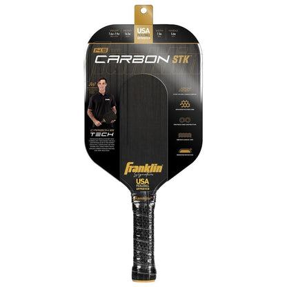 Franklin Carbon STK 14.5mm Pickleball Paddle by Franklin, in black packaging showing product details and specs, features an image on the left of a person holding the USAPA approved carbon fiber paddle.