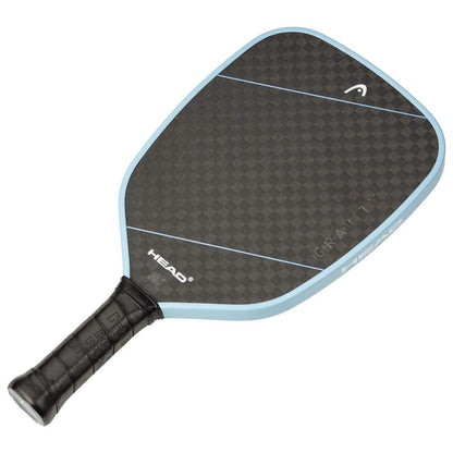 The HEAD Gravity Tour 2025 Pickleball Paddle by HEAD features a black and gray checkered face with "HEAD" and "GRAVITY," a light blue edge, black handle, and a 12k raw carbon surface for superior control and performance.