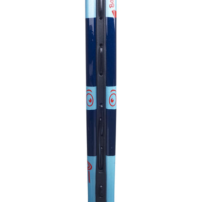 A close-up of the side of the Babolat BallFighter 17 Junior Tennis Racket highlights its striking blue and red color scheme. Designed with beginner tennis players in mind, this racket features a series of string holes along its frame, making it ideal for teaching grip techniques on your tennis journey.