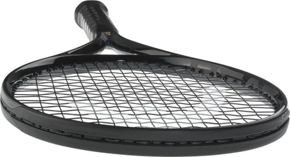 A close-up shows the HEAD Speed MP Legend 2025 Tennis Racket, lying on its side with visible strings and frame. The modern black design and taped grip echo Novak Djokovic’s signature style.