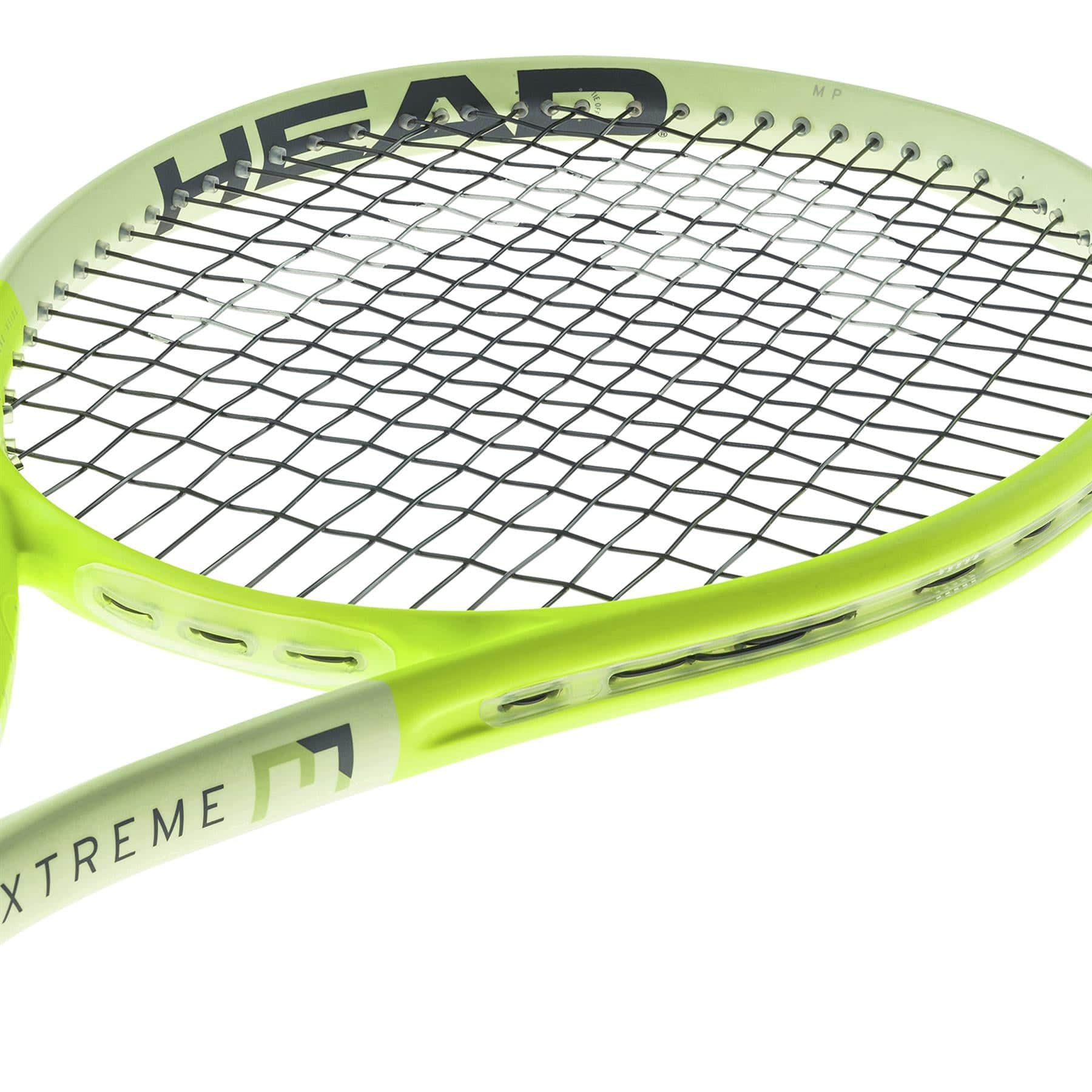 The HEAD Extreme MP 2024 Tennis Racket in green, featuring black strings, displays a modern and sleek design. It prominently features the "HEAD" logo on the rim and "EXTREME" along the side, utilizing HEAD Auxetic 2.0 technology for outstanding spin control.