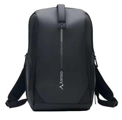 The Kanso Intuko Tennis 23L Backpack in black, perfect for everyday use, showcases a vertical zipper and "kanso" printed near the bottom. It features padded shoulder straps, a top handle, and an extra compartment for organized storage against a plain white backdrop.