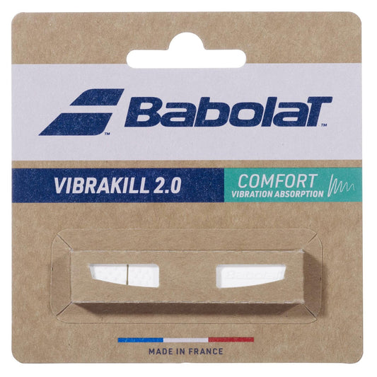 Brown cardboard packaging for the Babolat Vibrakill 2.0 Tennis Dampener - White by Babolat, a comfort accessory that absorbs racket vibrations; “Made in France” appears at the bottom.