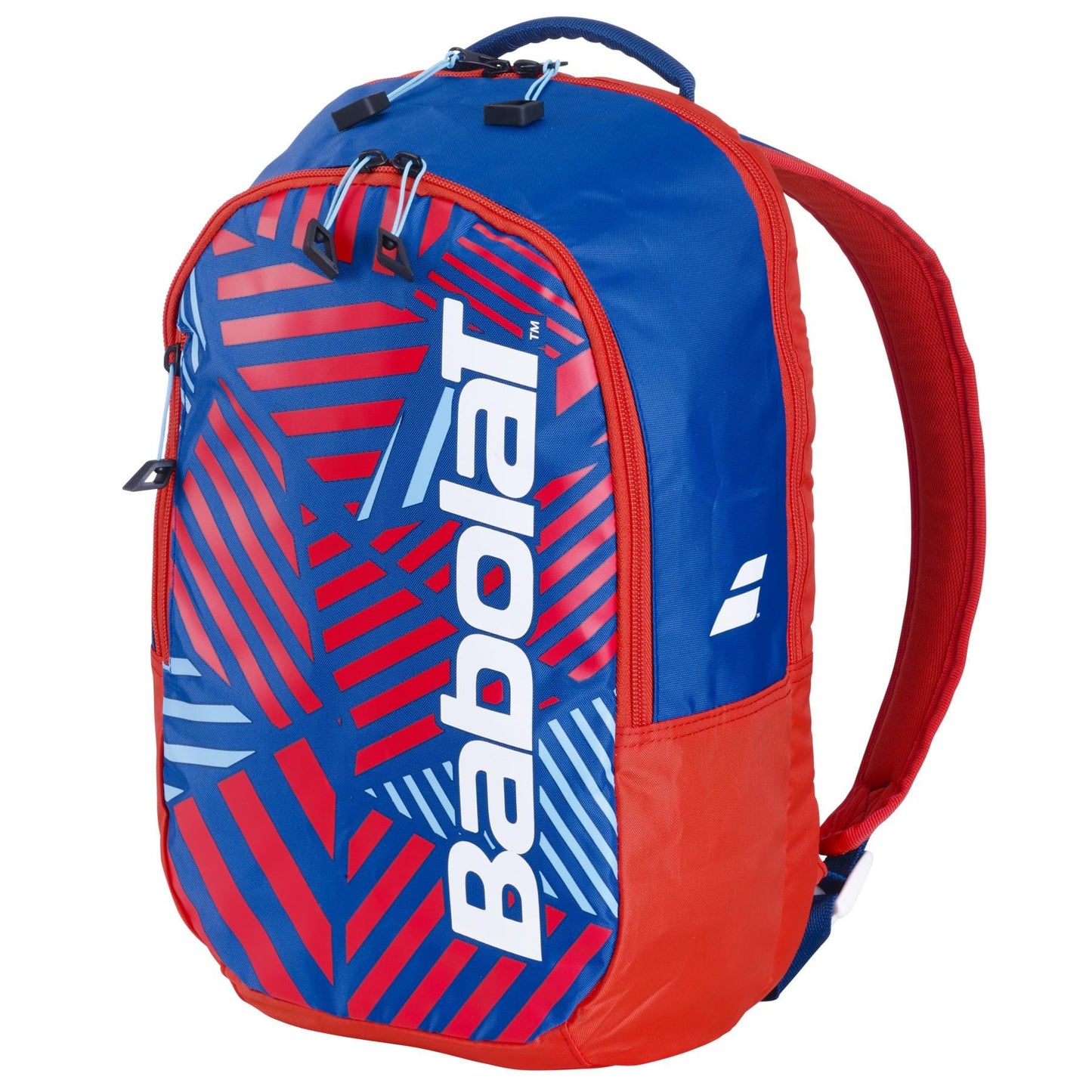 The Babolat Kids Tennis Backpack in blue and red features a geometric pattern with the brand name in large white letters. Designed for young athletes, it has a top handle, two shoulder straps, and a zippered compartment.