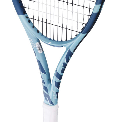 Close-up of the Babolat Pure Drive Junior 26 Gen 11 Tennis Racket with black strings and a white grip, showcasing the Babolat brand and frame details—ideal for advanced young players seeking precision and style.