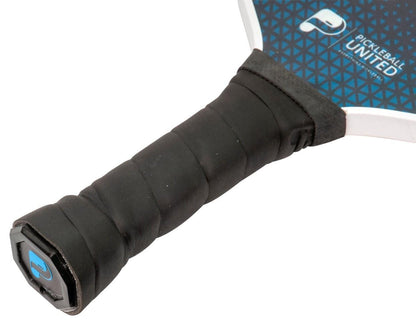 Close-up of the Pickleball United Freedom Pickleball Paddle, showing its black grip, blue geometric design, "Pickleball United" logo, and a durable fiberglass hitting surface.