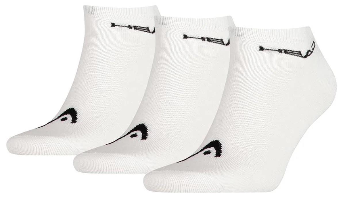 Three pairs of HEAD Sneaker Tennis Socks in white, crafted from a soft cotton blend for comfort, feature a black logo on toes and cuff.