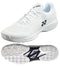 The Yonex Power Cushion Sonicage 2025 Men's Tennis Shoes in white are shown from two angles. They feature a textured upper with the Yonex logo, a herringbone-patterned sole with black inset for grip, and Power Cushion technology for lightweight comfort and stability.