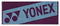 The Yonex AC1113EX Tennis Sports Towel - Bordeaux is a 100% cotton rectangular towel with a Bordeaux background, featuring the Yonex logo and name diagonally—ideal for your sports sessions.