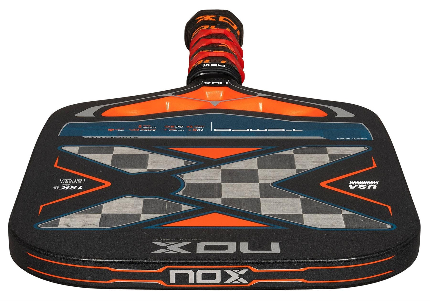 The NOX Luxury Tempo Pickleball Paddle features 18K aluminised carbon fibre and Exclusive Spin technology; it comes in black with orange accents, checkered patterns, and a red-and-black grip, shown against a white background.