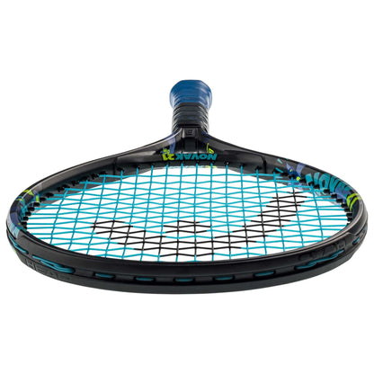 A close-up of the HEAD Novak 21 Junior Tennis Racket in black and blue emphasizes its sleek design. An angled perspective showcases the strings, frame, and a blue grip on the handle. Enhanced with a Damp+ insert for added comfort, this racket represents the excellence of HEAD ambassador Novak Djokovic.
