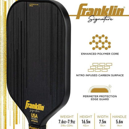 The Franklin Carbon STK 17mm Pickleball Paddle features a black, textured nitro-infused carbon surface, gold accents, enhanced polymer core, perimeter protection edge guard, and is USAPA approved for top performance and style.