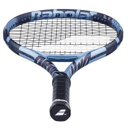 The Babolat Pure Drive Junior 26 Gen 11 Tennis Racket, shown from the handle to highlight its strings and logo, is a blue and black kids’ racket perfect for young players.