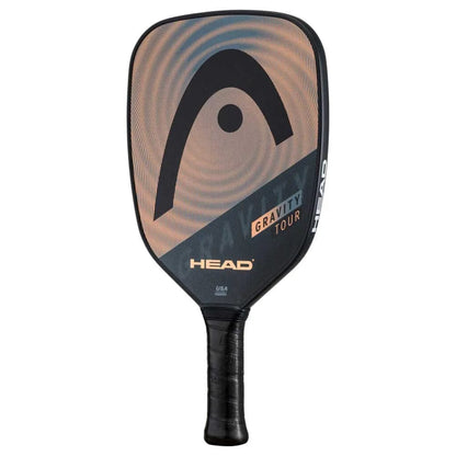 The HEAD Gravity Tour 2023 Pickleball Paddle by HEAD features SpinOn technology, a black handle, rounded rectangular face, and a black, gold, and tan design with the HEAD logo and "Gravity Tour" text on the face.