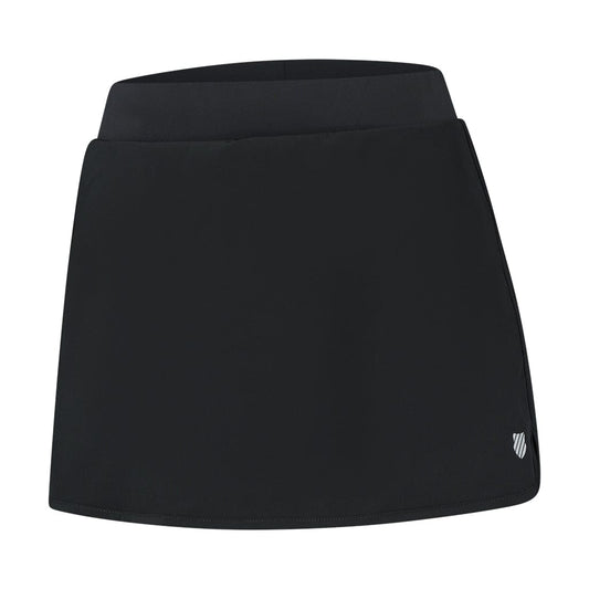 The K-Swiss Tac Hypercourt Pleated Tennis Skirt 4 in black includes a wide waistband, 4-Way Density Stretch technology for enhanced comfort, and a small logo near the bottom hem.