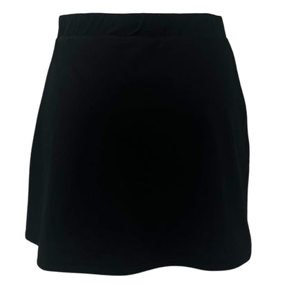 The Yonex YSKT2024 Women's Tennis Skirt, in black, features a classic A-line silhouette. Knee-length with a smooth finish, it's crafted from lightweight, breathable materials with moisture-wicking properties for ultimate comfort and ease.