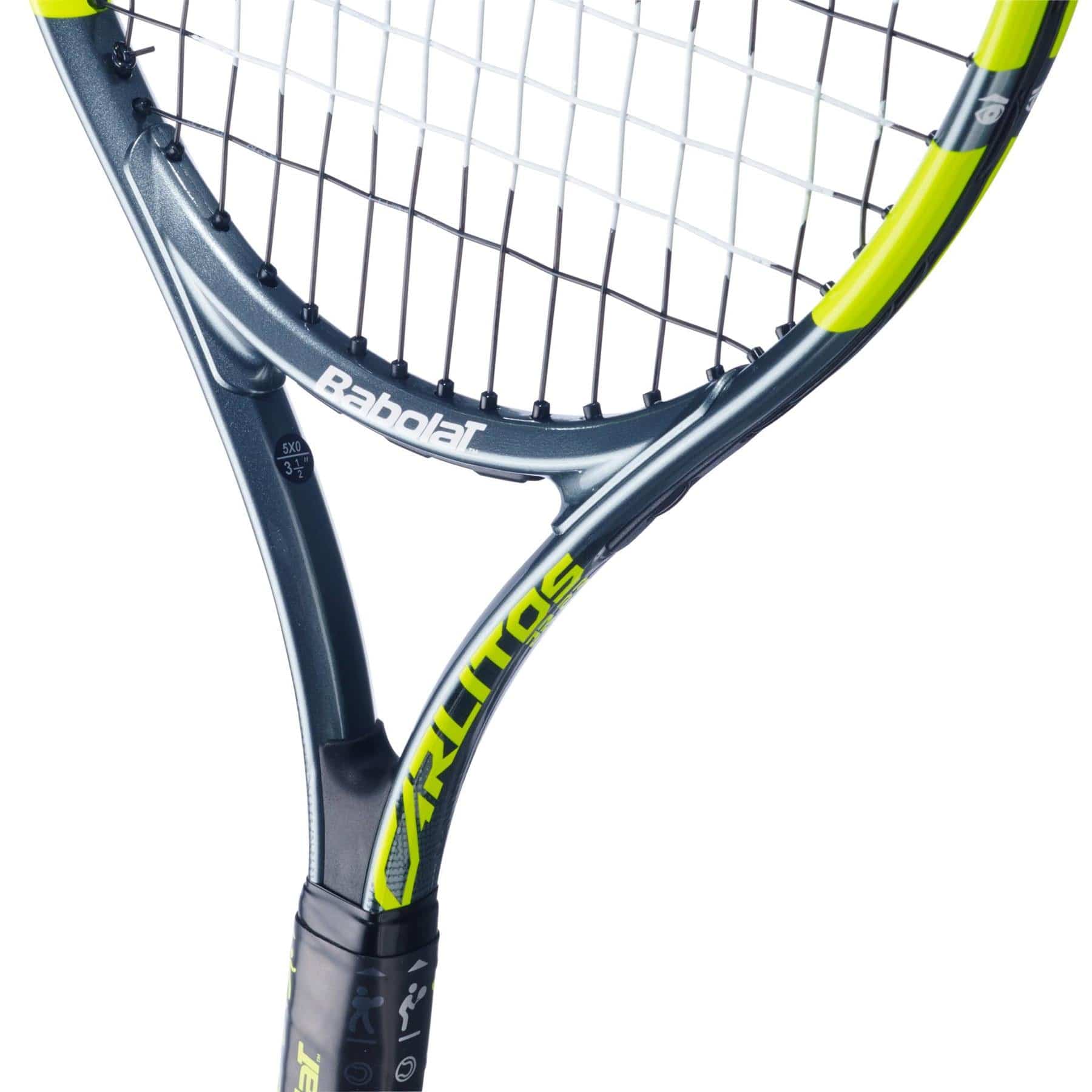 Close-up of the Babolat Carlitos Junior 23 Tennis Racket for kids, showcasing a black and yellow frame, white strings, and prominent Babolat logos on the throat and shaft.