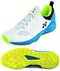 The Yonex Power Cushion Lumio 4 Men's Tennis Shoes, featuring a combination of white and ocean blue, exhibit a versatile design. One shoe displays the side and top views, while the other reveals a lightweight yet durable light-yellow sole with a textured pattern ideal for tennis enthusiasts.