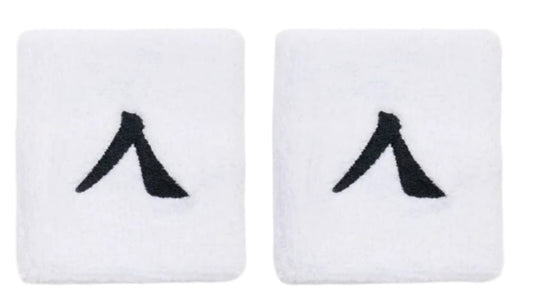 The Kanso 7cm Wristband 2 Pack in white, displayed on a white backdrop, are crafted from absorbent fabric and each features a black symbol at the center, capturing the brand's essence with their simple yet impactful design.