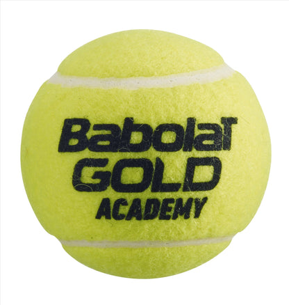 A close-up of a Babolat EVO Gold Academy Tennis Ball from the 3 Ball Tube highlights its vibrant yellow color and black text displaying the brand name, Babolat, and model. Ideal for beginner to intermediate players, this pressureless ball boasts a striking fuzzy texture designed for enduring performance.