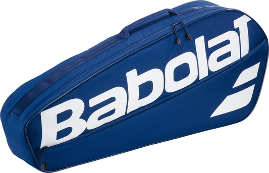 The Babolat Court XS 3 Racket Tennis Bag - Blue features a large white Babolat logo and zipper, offering a compact design to carry rackets and gear.