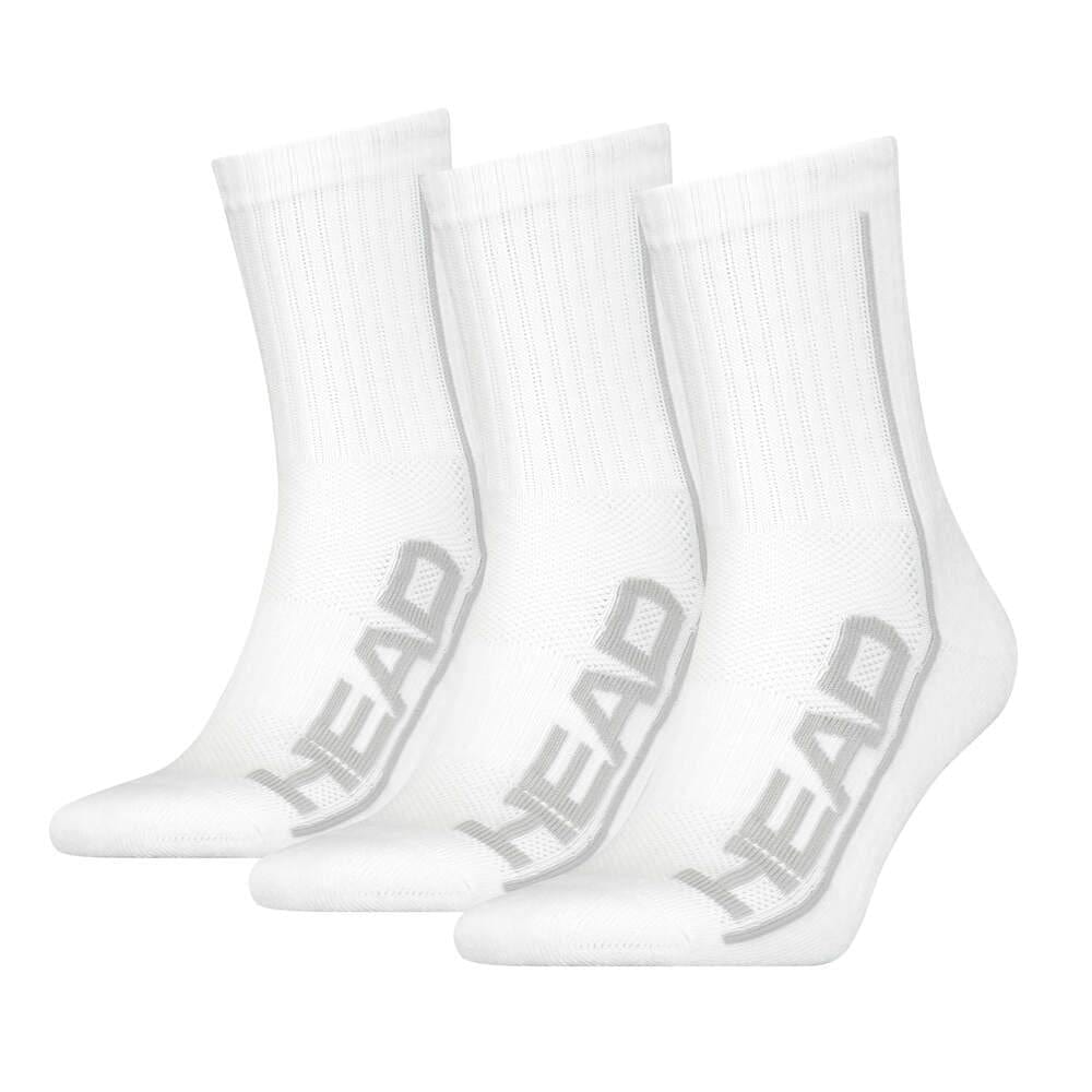 Displayed upright on a simple white background are three pairs of HEAD Performance Tennis Socks (3 Pack) in white, with gray "HEAD" lettering along the sides. Designed for ultimate comfort on the court, these socks feature arch support and shock absorption.