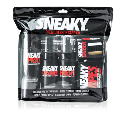 The image features the Sneaky Complete Shoe Cleaning Kit, packaged in transparent wrapping. This all-inclusive kit provides shoe cleaner, a Sneaky Spray Protector, freshener, wipes, and a cleaning eraser with brush—all prominently displaying the Sneaky brand logo.