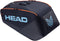 The HEAD Pro 9 Racket Tennis Bag L - Navy by HEAD is a large, dark blue bag with a light blue logo and orange zippers, perfect for carrying tennis gear or ski boots like Jannik Sinner. Shown on a white background.