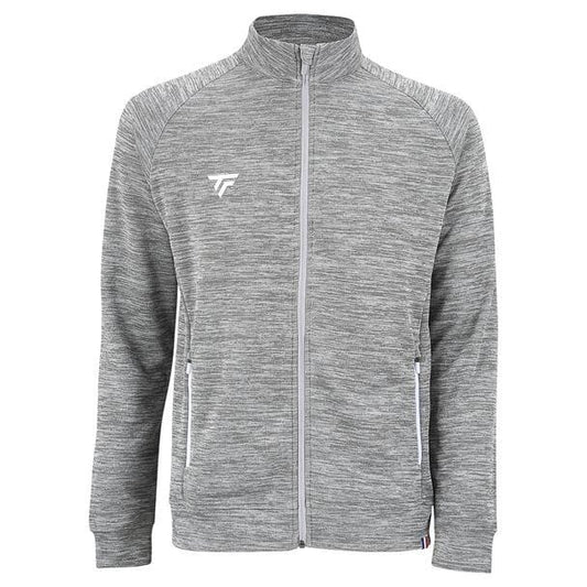 The Tecnifibre Men's Team Tennis Jacket - Silver is a lightweight and breathable design featuring long sleeves and a high collar. Made from stretchy polyester double mesh fabric for a textured look, it includes white zippered pockets on both sides and sports a subtle logo on the left chest.