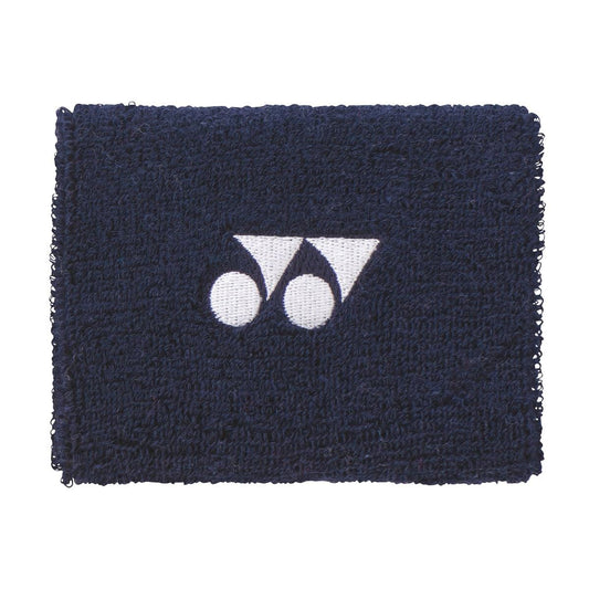 A Yonex AC492 Wristband in navy blue, featuring the brand's logo in white with two circles and a triangular design. The texture is cool and dry, providing softness and absorbency to keep you comfortable.