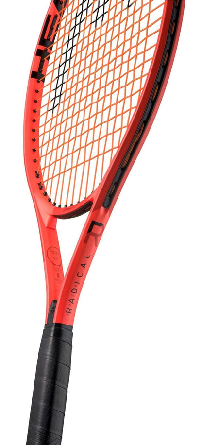 A close-up of the HEAD Radical Junior 26 2025 Tennis Racket shows its frame and handle with black strings and grip. The word "RADICAL" is visible on the side of this HEAD kids’ tennis racket.
