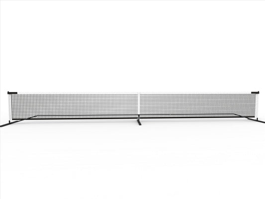 The Pickleball United Driveway 10 Junior Pickleball Net by Pickleball United is shown set up on a white surface, featuring black and white colors, freestanding design with two vertical end poles, and a base support bar.