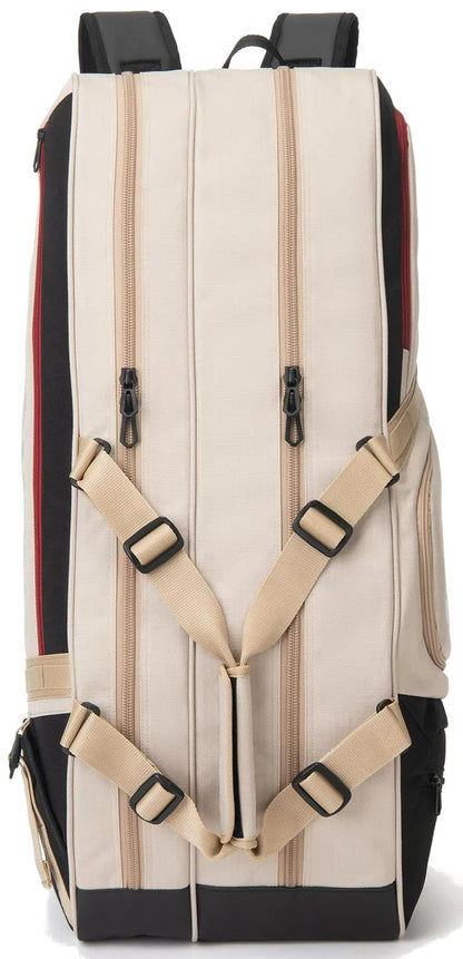The Yonex BA72626EX Gearlogic 6 Racket Tennis Bag in beige features black accents, tan adjustable shoulder straps, two vertical zippered compartments, side pockets, and is made from recycled polyester for eco-friendly durability.
