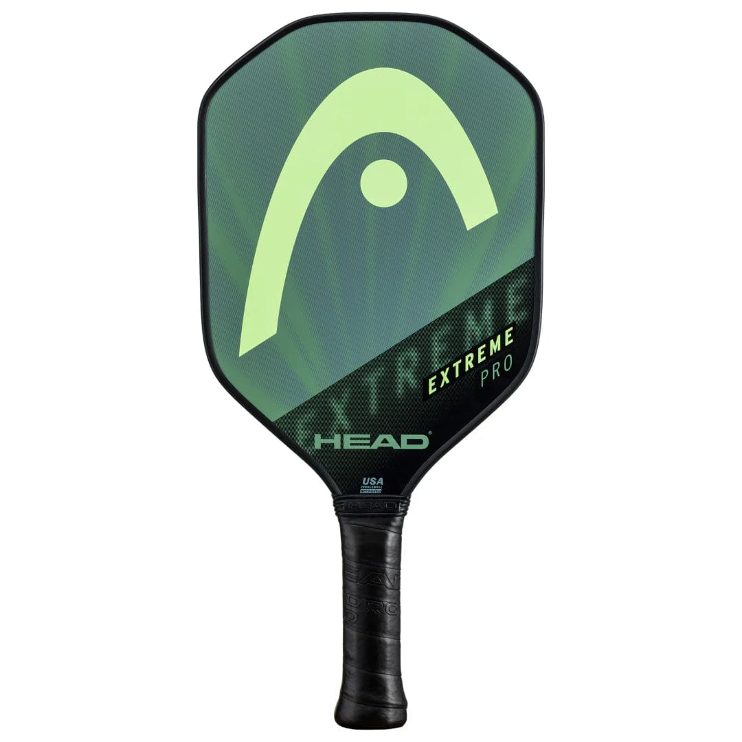 The HEAD Extreme Pro 2023 Pickleball Paddle features a green and black design, composite hitting surface, large lime green logo, textured face, comfort grip handle, and "EXTREME PRO" printed on the paddle.