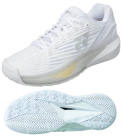 Introducing the Yonex Power Cushion Eclipsion 5 Women's Tennis Shoes in white, featuring a sleek athletic design with a textured side and signature logo near the heel. The sole showcases advanced Feather Bounce Foam technology, highlighted separately to emphasize its zigzag tread pattern for superior grip. Ideal as all-court tennis shoes for women, these offer exceptional comfort and performance on any surface.