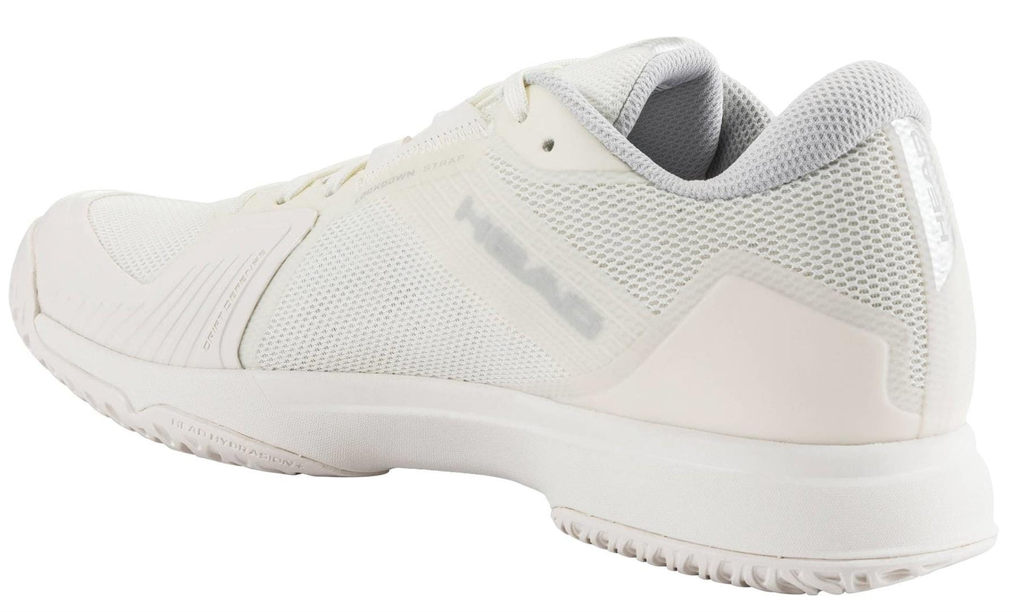 The HEAD Sprint Team 4.0 Womens Tennis Shoes in Chalk White / Light Grey feature mesh fabric, a rubber sole, and a textured outsole for grip. Lightweight and athletic, they display the "HEAD" brand name on the side, shown from the back left view.