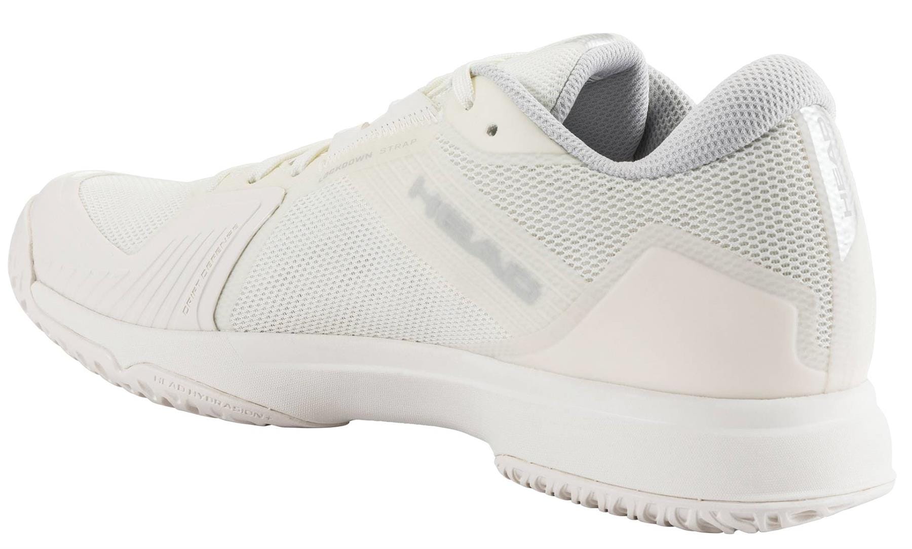 The HEAD Sprint Team 4.0 Womens Tennis Shoes in Chalk White / Light Grey feature mesh fabric, a rubber sole, and a textured outsole for grip. Lightweight and athletic, they display the "HEAD" brand name on the side, shown from the back left view.